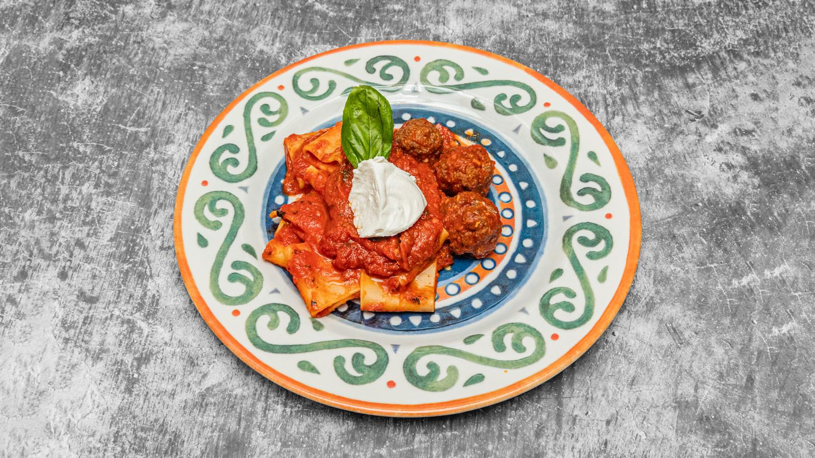 Fresh handmade pasta with meatballs